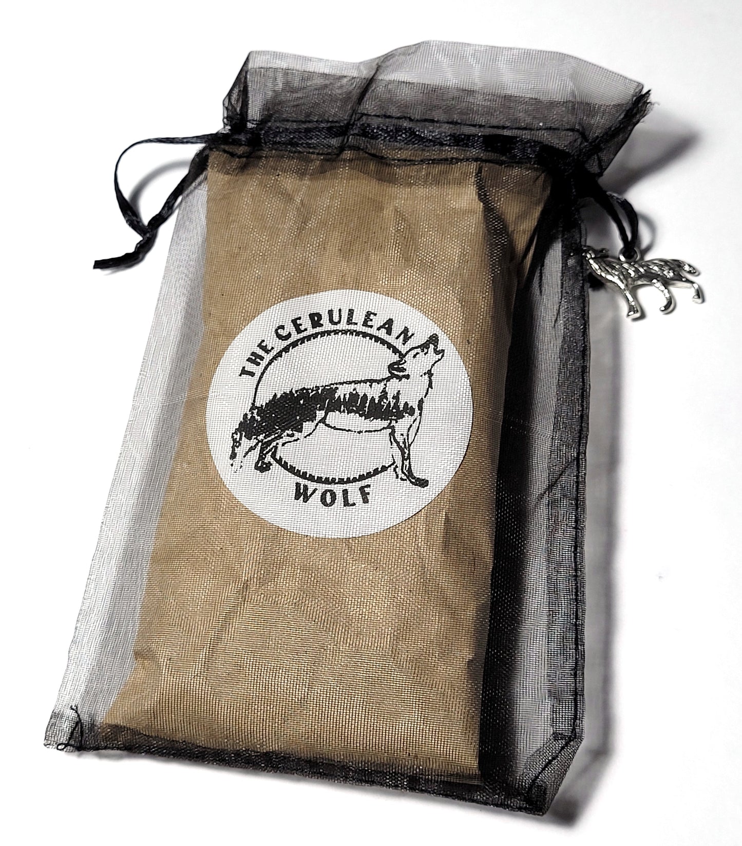 Brown drawstring bag with 'The Cerulean Wolf' logo on a white background