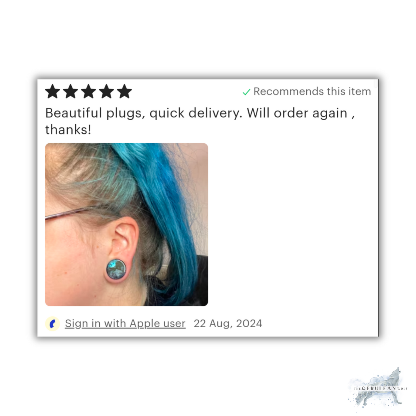 A five-star review shows someone with teal hair wearing Customisable Double Flared Plugs by The Cerulean Wolf, praising the quick delivery of the handmade jewelry and planning to order again.