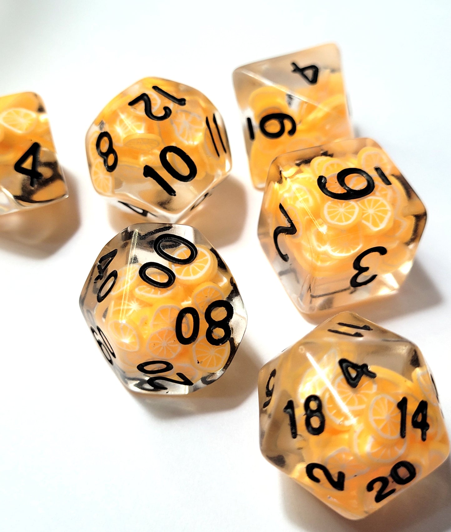 7 Orange Slice Black Inscription DND Dice - The Cerulean Wolf