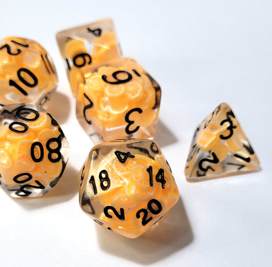7 Orange Slice Black Inscription DND Dice - The Cerulean Wolf