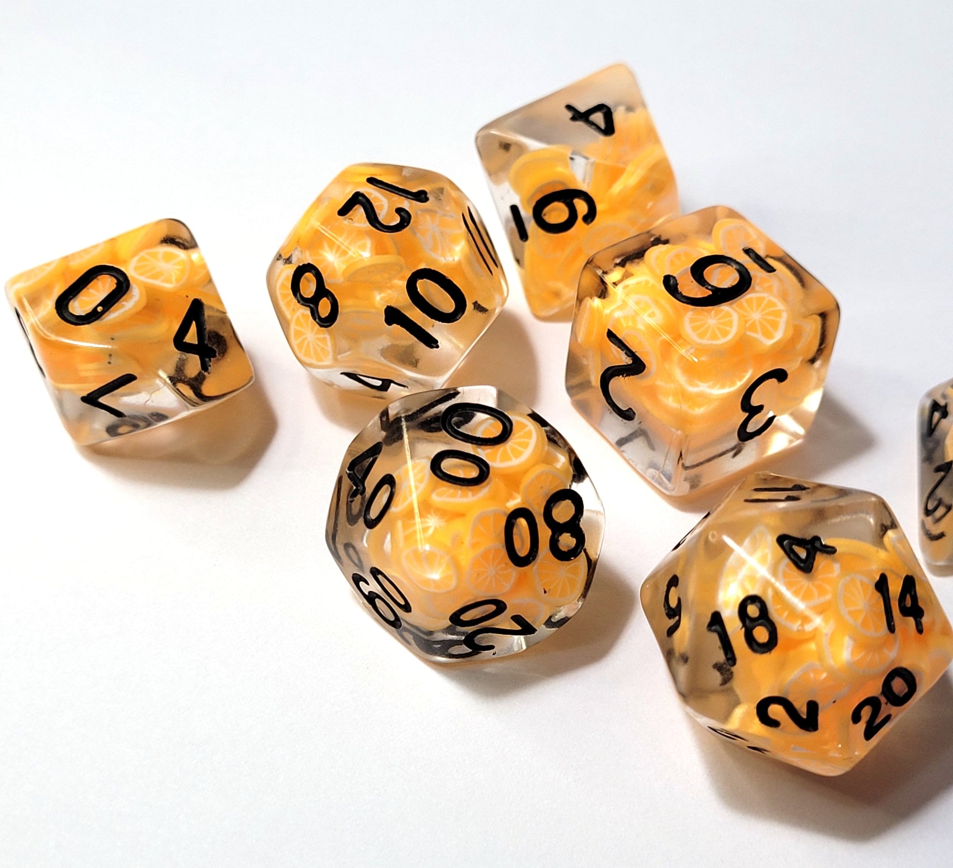 7 Orange Slice Black Inscription DND Dice - The Cerulean Wolf